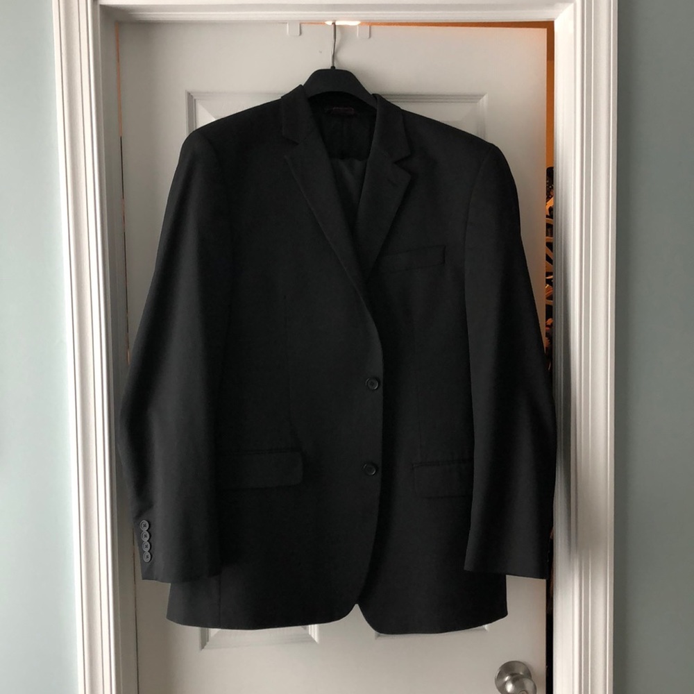 Black IZOD suit, jacket is 44L.  Pants are 38/32.